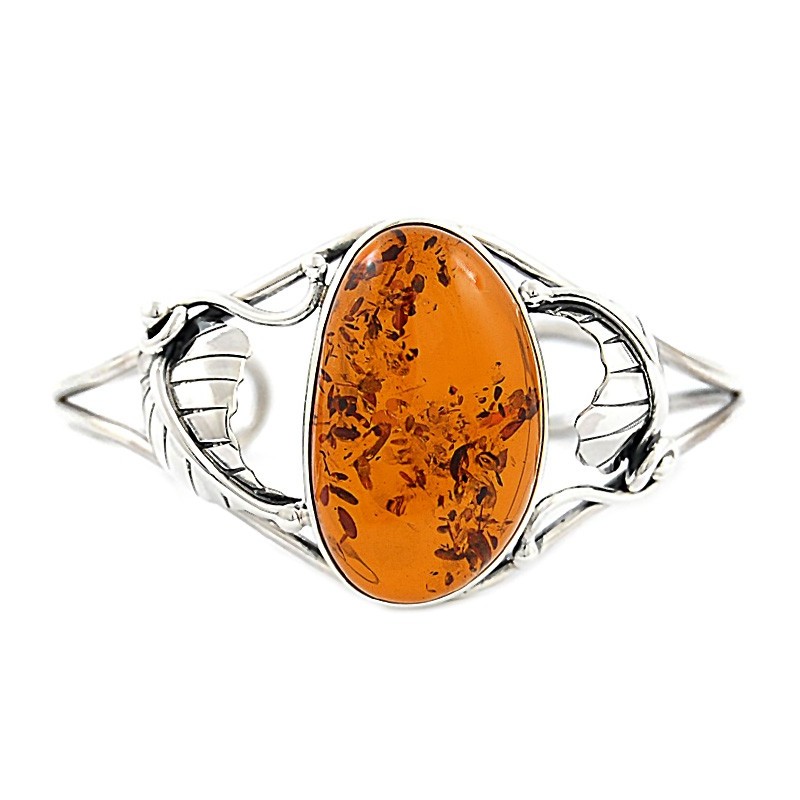 Unikatowa bransoletka ze srebra 925 z dużym naturalnym bursztynem w koniakowym kolorze, ozdobiona listkami.