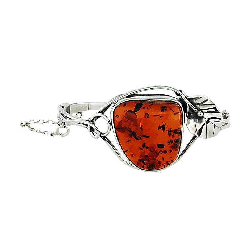 Piękna bransoletka ze srebra 925 wykonana całkowicie ręcznie z dużym bursztynem w koniakowym kolorze.