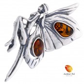 Broszka srebrna 925 z bursztynem w kolorze koniaku o kształcie kobiecego elfa ze skrzydłami jak motyl.