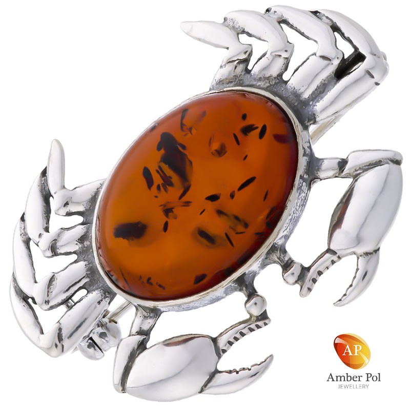 Broszka krab, ze srebra 925 z dużym bursztynem w kolorze koniaku.