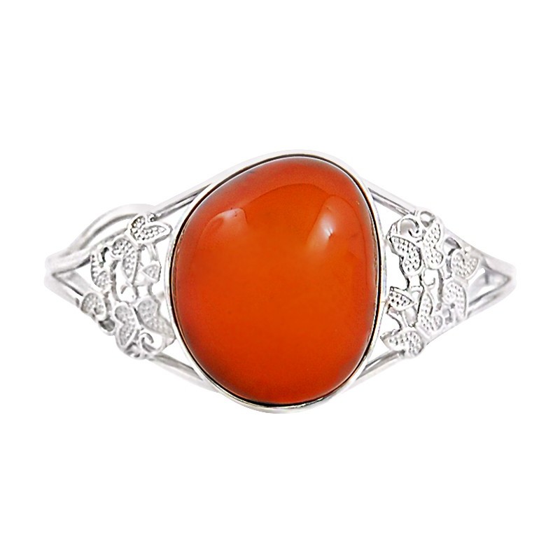 Piękna unikatowa bransoletka z ażurowym zdobieniem i dużym wiśniowym bursztynem.