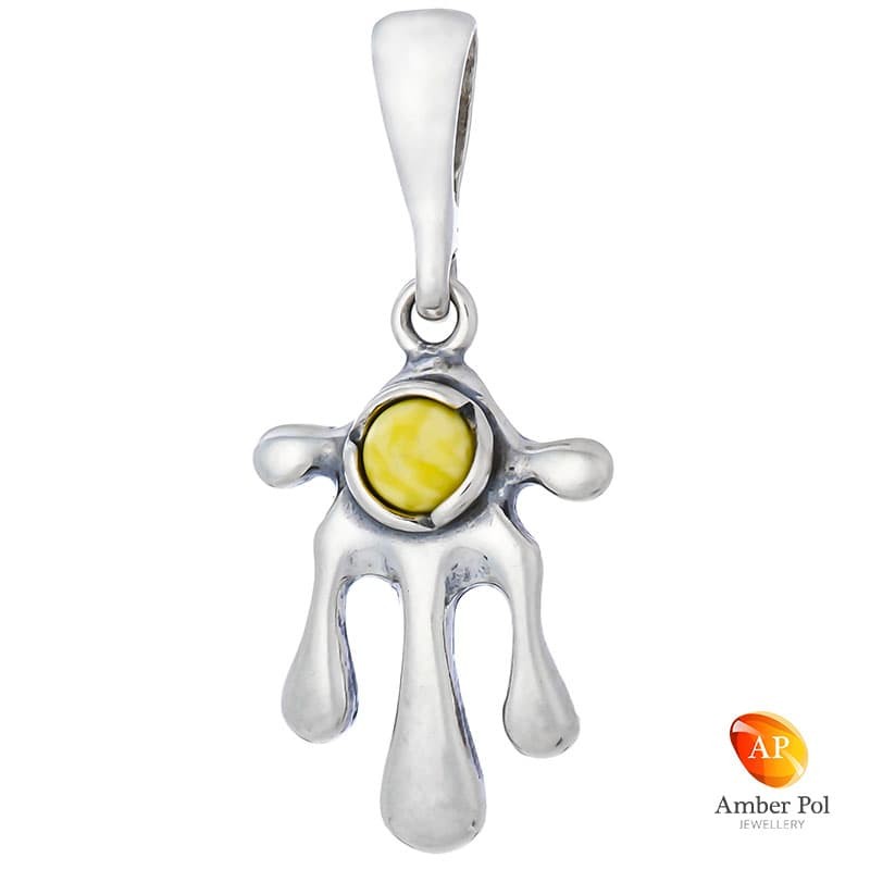 Wisiorek ze srebra 925 z bursztynem w kolorze białym o nieregularnym kształcie lekko przypominającym kleksa.