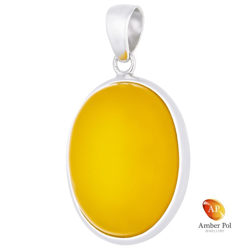 Unikatowy wisior srebrny 925 z pięknym mlecznym bursztynem wkomponowanym w stylowa oprawę z delikatna zawieszką.