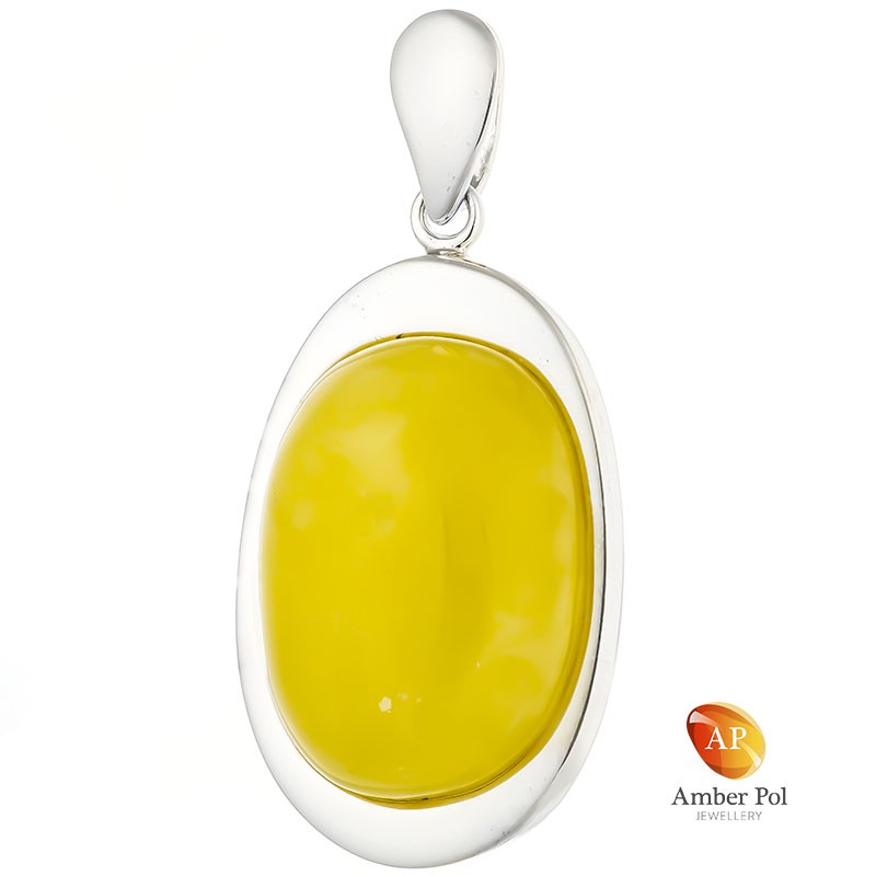 Unikatowy wisior srebrny 925 z pięknym białym bursztynem oprawionym ręcznie w stylowej eleganckiej wersji.