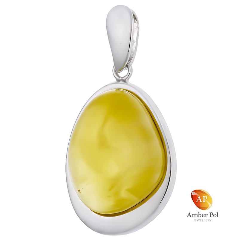 Unikatowy wisior srebrny 925 z pięknym białym bursztynem oprawionym ręcznie w stylowej eleganckiej wersji.