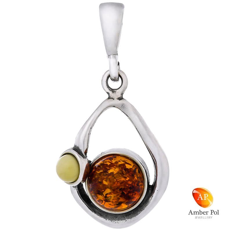 Wisiorek ze srebra 925 o nieregularnym  kształcie ozdobiony dwoma bursztynami w kolorze mix.