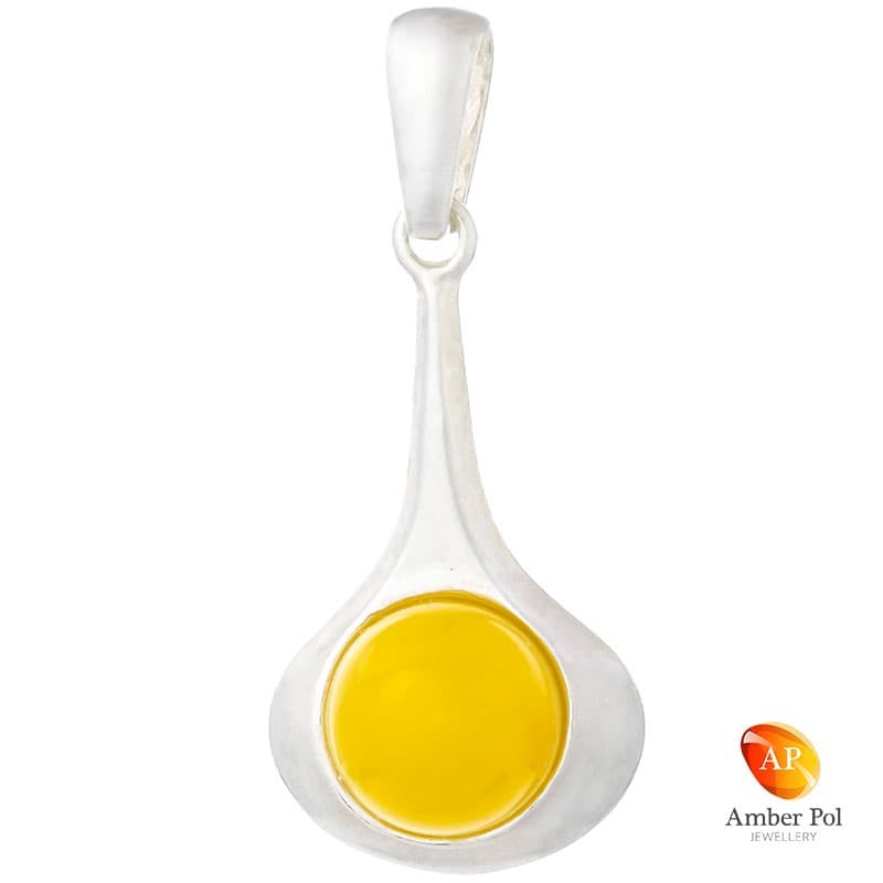 Piękny wisiorek srebrny 925 z   bursztynem w kolorze białym, gładkie powierzchnie i wydłużony kształt dodają elegancji.