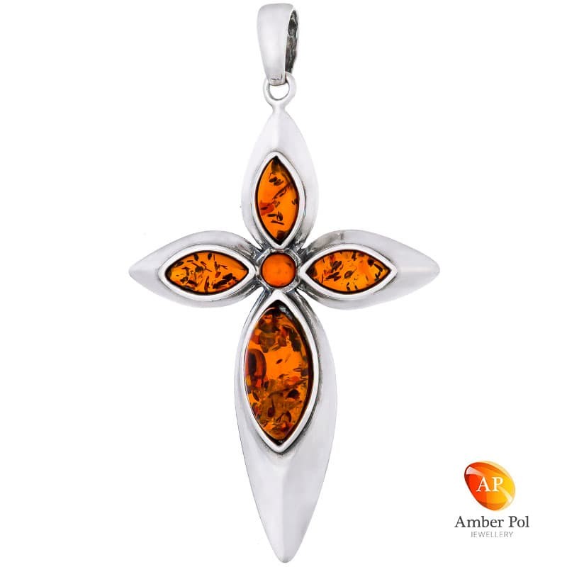 Przepiękny wisiorek ze srebra 925 w kształcie krzyża z bursztynami w koniakowym kolorze.