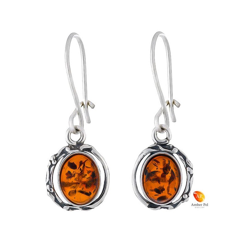 Kolczyki wiszące ze srebra 925 na zawieszce typu bigiel zapinany z owalnym  bursztynem w kolorze koniakowym.