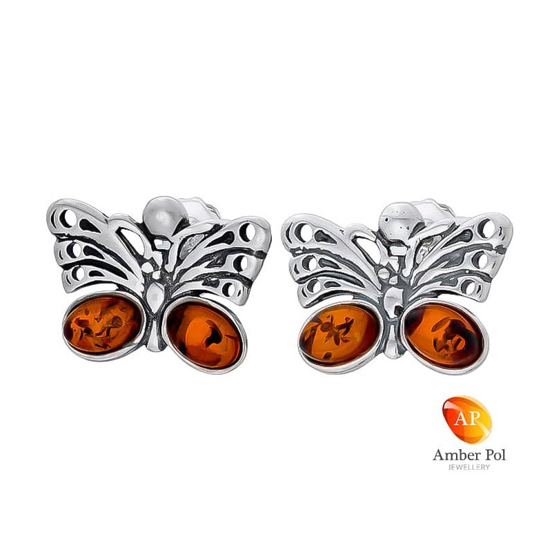 Piękne kolczyki motylki ze srebra 925  na sztyft i dwoma owalnymi  koniakowymi bursztynkami w skrzydełku.