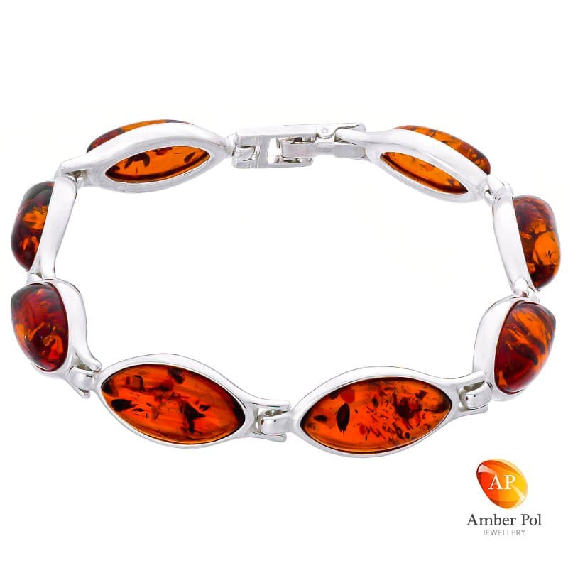 Bransoletka ze srebra 925 z pięknymi dużymi bursztynami w kolorze koniaku o wydłużonym kształcie z 8 elementami.