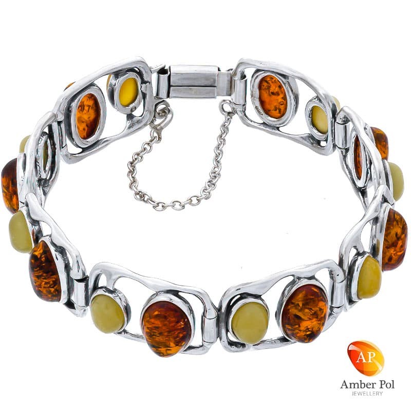 Srebrna 925 bransoletka z bursztynami w kolorze koniakowym i białym. posiadająca 8 elementów w każdym po 2 bursztynki.